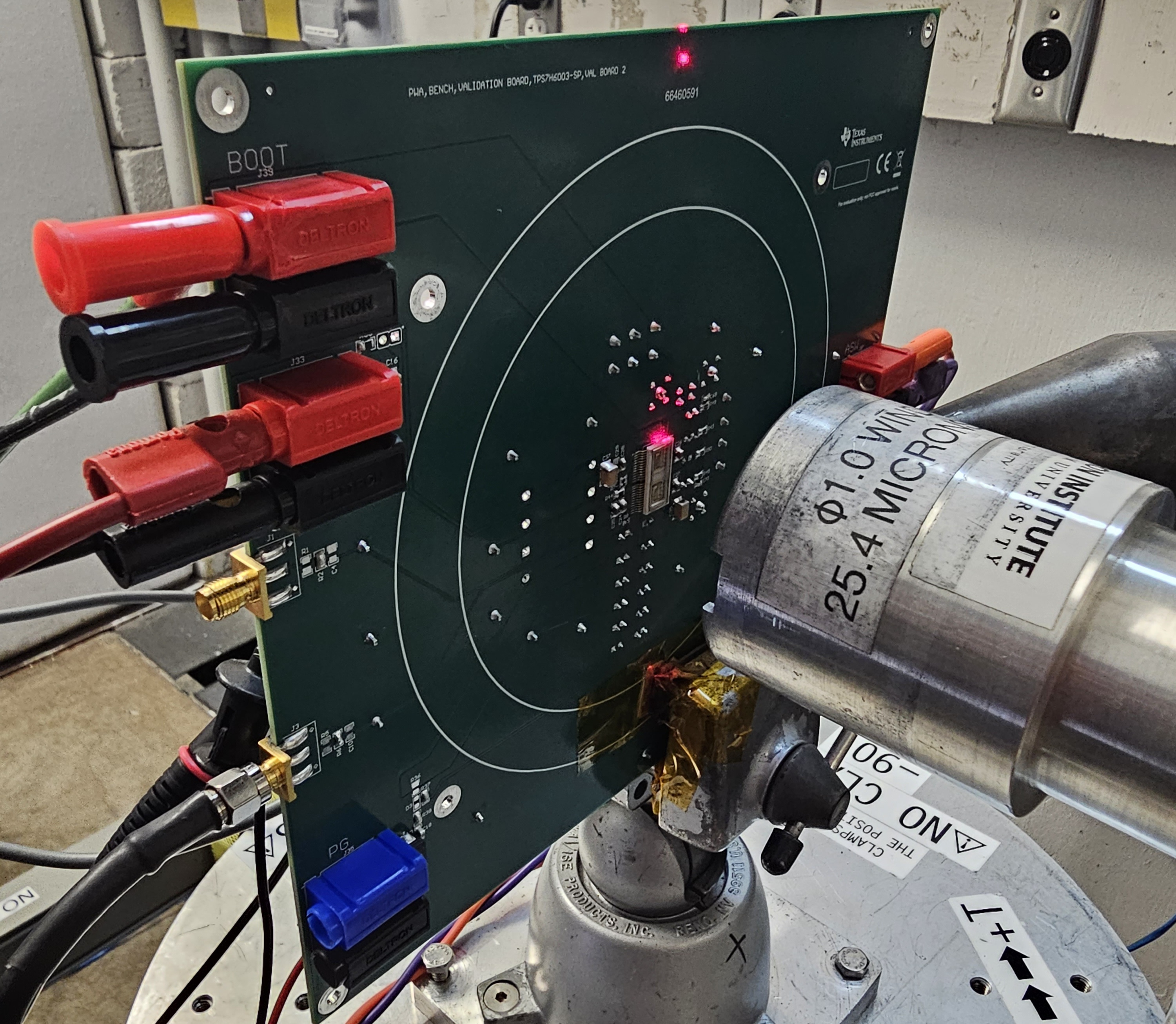 TPS7H6003-SP Photograph of the TPS7H60X3-SP
                    Evaluation Board in Front of the Heavy-Ion Beam Exit Port at the Texas A&M
                    Cyclotron